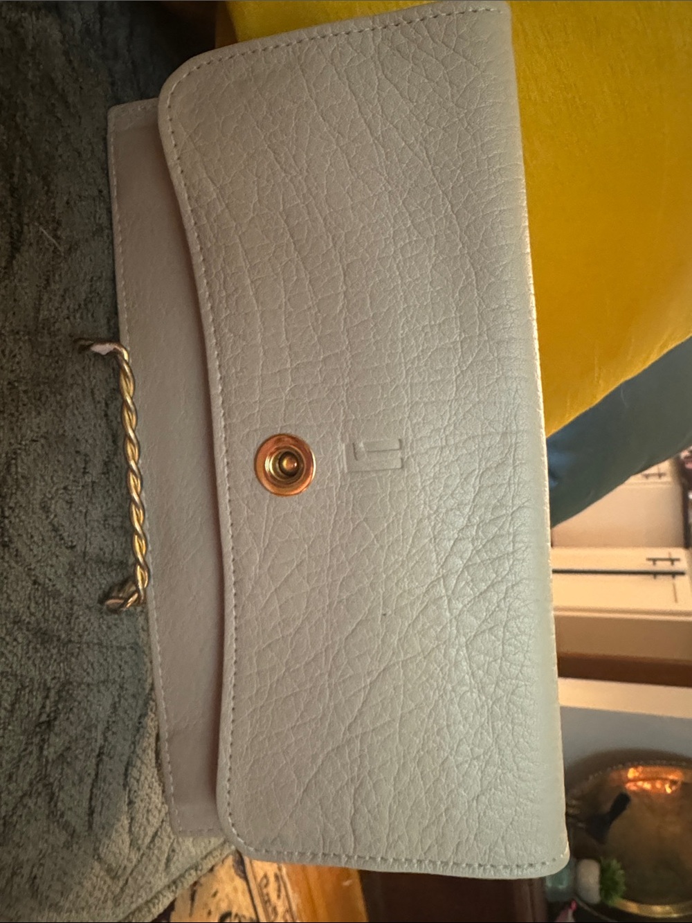 Elegant White Leather Wristlet Clutch with Gold Chain Accent